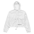 A white cropped hooded windbreaker jacket with a half-zip front, drawstring hood, and elastic hem, featuring the text 'Wing & Wood Co.' printed in black near the lower right front.