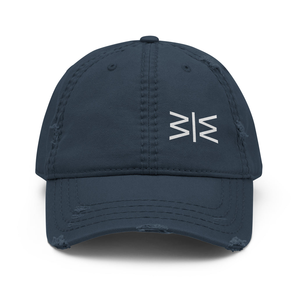 A dark navy blue distressed baseball cap with a white stylized logo on the front, shown against a plain white background.