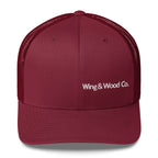A maroon trucker-style baseball cap with white embroidered text reading 'Wing & Wood Co.' on the front, shown against a plain white background.