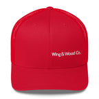 A bright red trucker-style baseball cap with white embroidered text reading 'Wing & Wood Co.' on the front, shown against a plain white background.