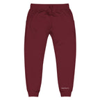 Maroon sweatpants with a brand logo on a white background