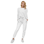 Woman wearing a white tracksuit with a logo on a white background