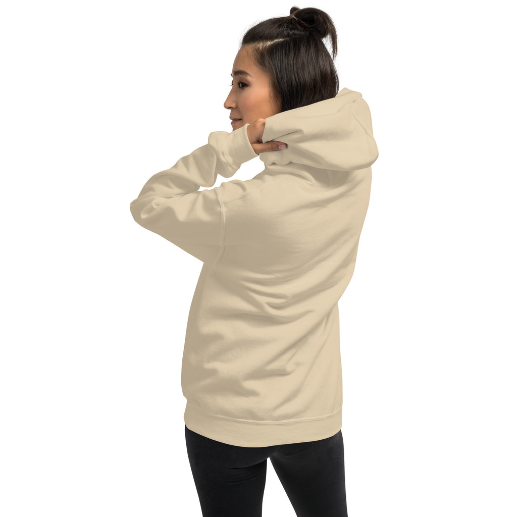 Woman wearing a beige hoodie on a white background