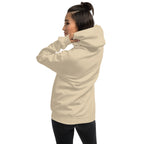 Woman wearing a beige hoodie on a white background