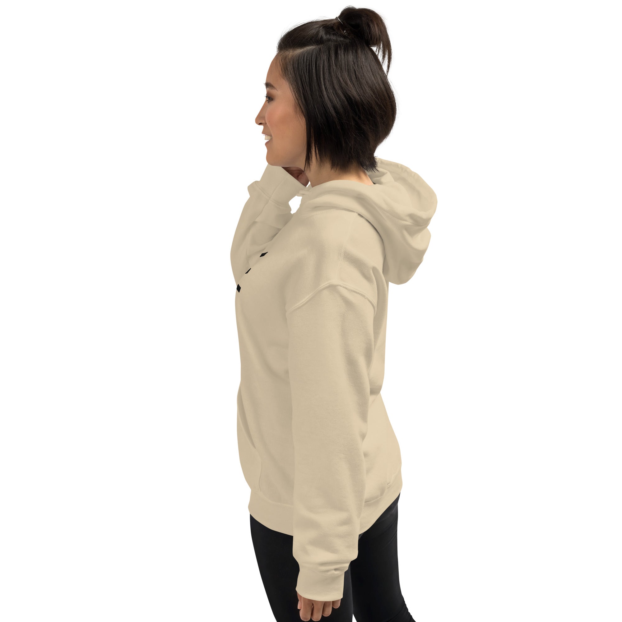 Woman wearing a beige hoodie on a white background
