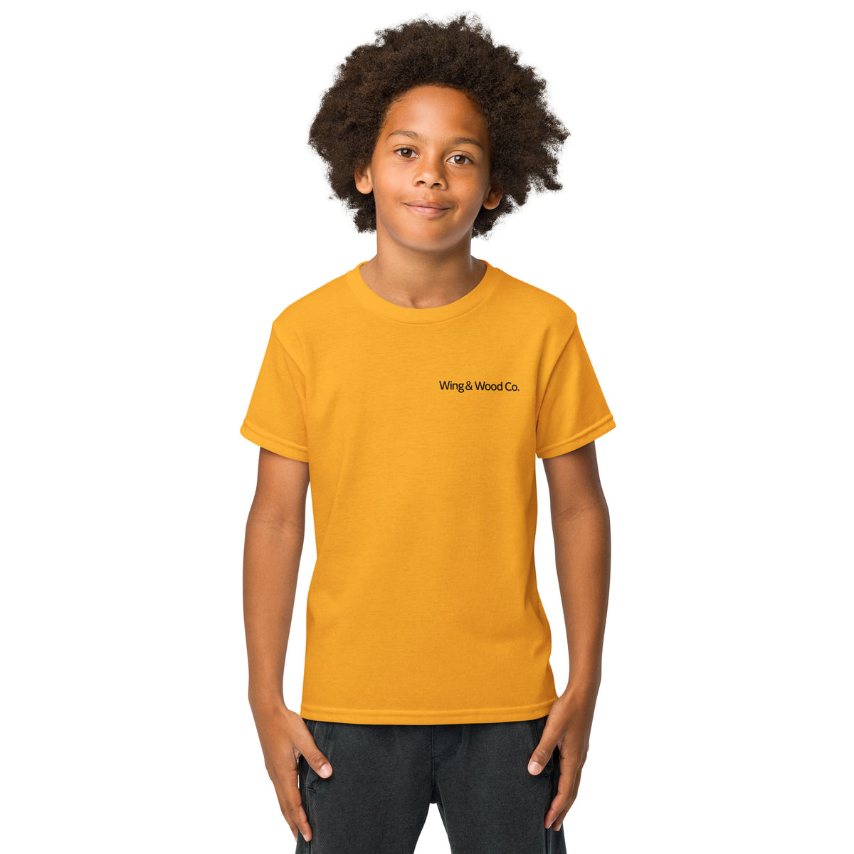 Child wearing a yellow t-shirt with text on a white background